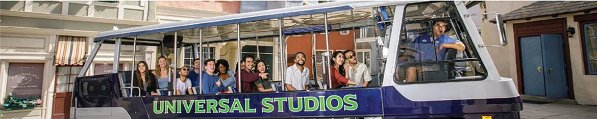 group of people on a tram in Universal Studios Florida.