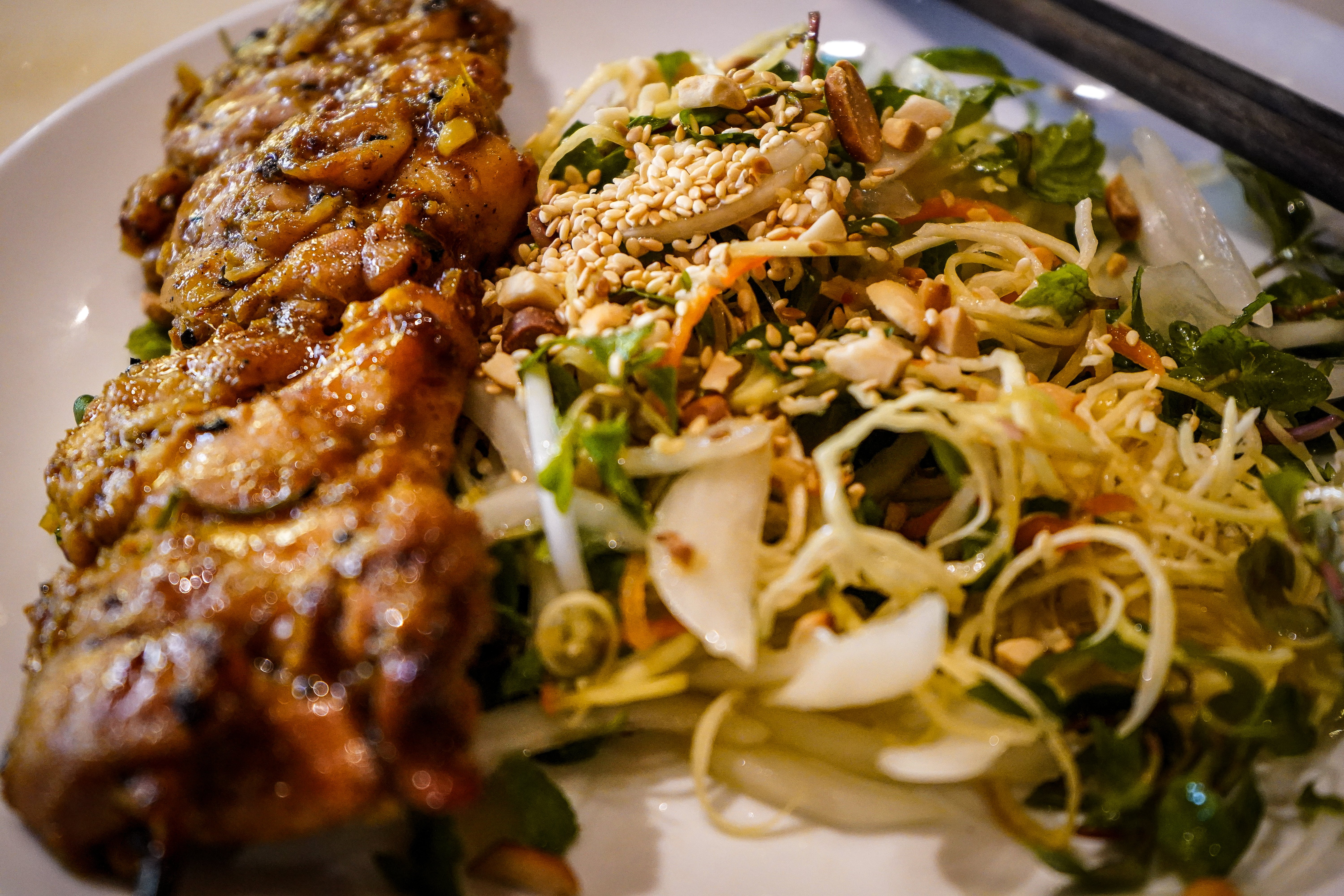Skewers of chicken satay cooked at Ms Vy's Cooking School