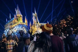 Two people celebrating the Holidays at Universal