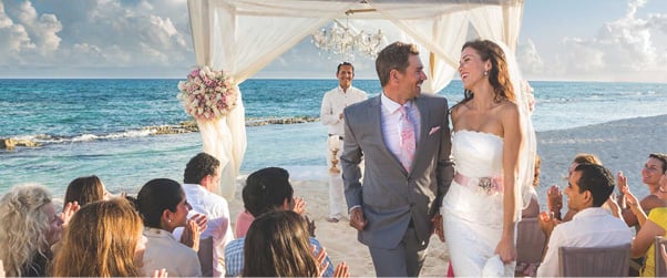 couple walking down the aisle of their wedding