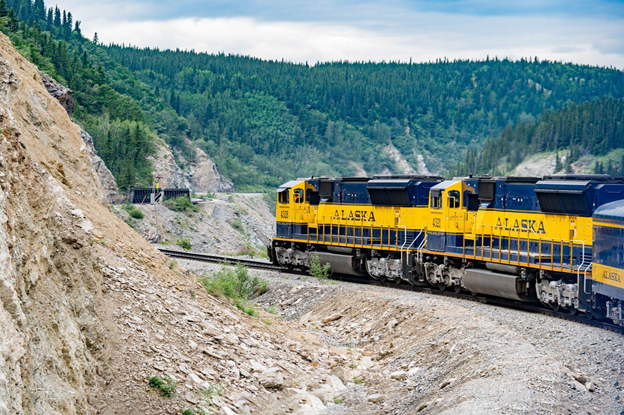 train going through the mountains