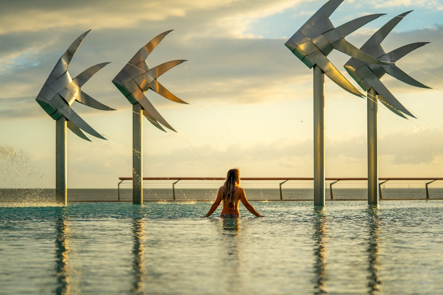 woman in an infiniti pool