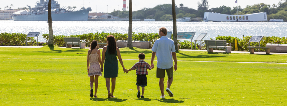 family walking hand in hand in Oahu