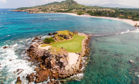 golf hole on an island in the ocean